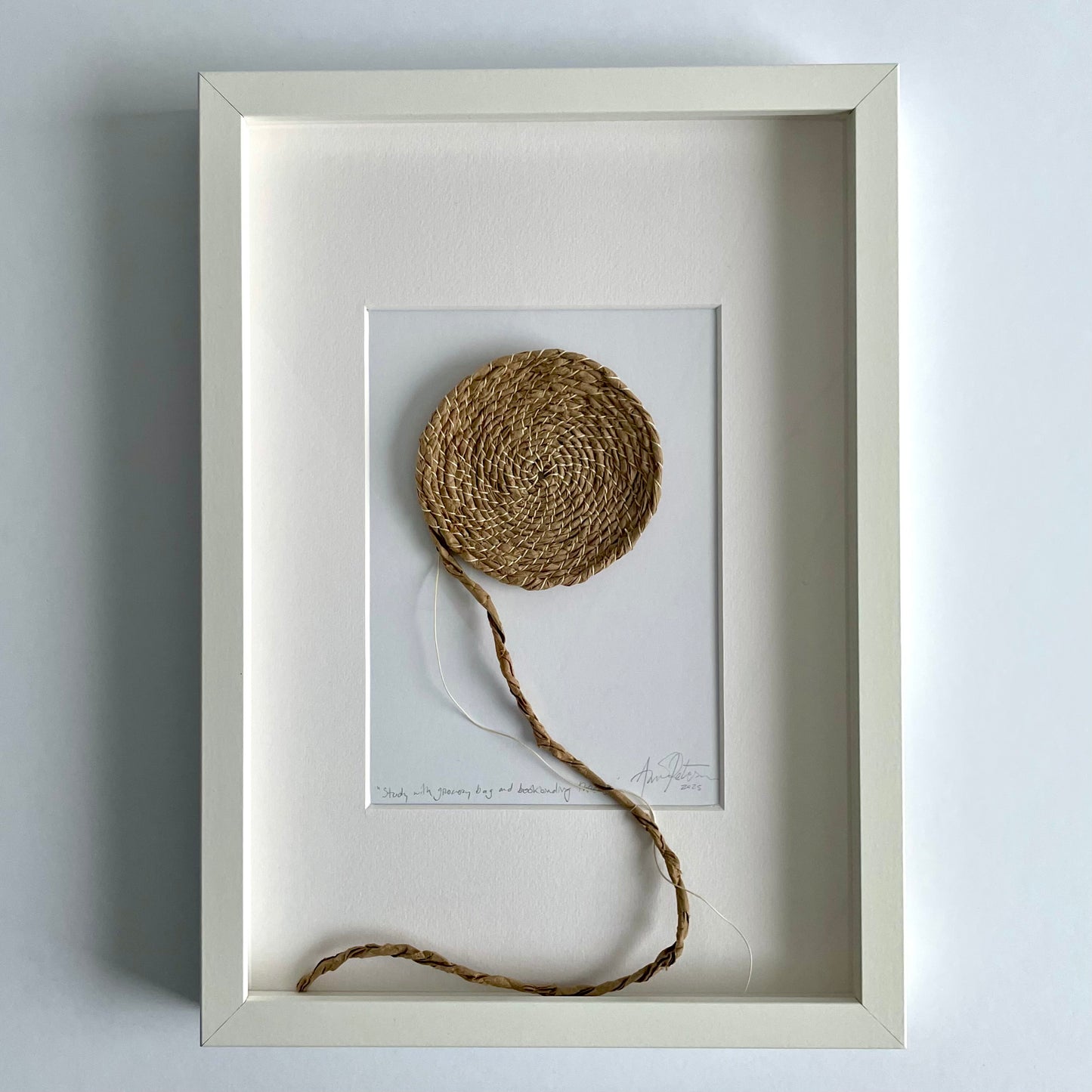 Study with grocery bag and bookbinding thread