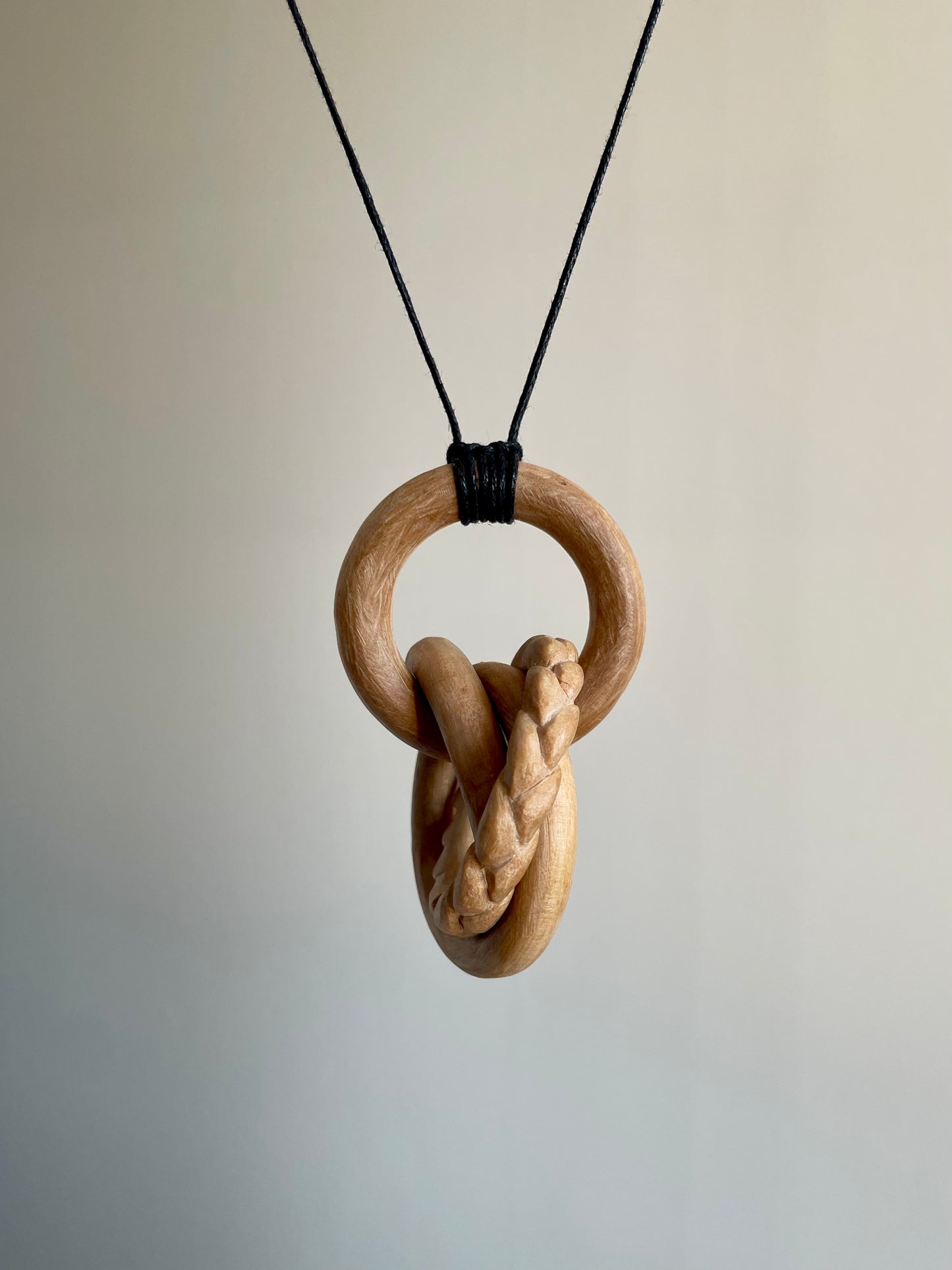 Large 4-Ring Knot with Braided Wheat Carving