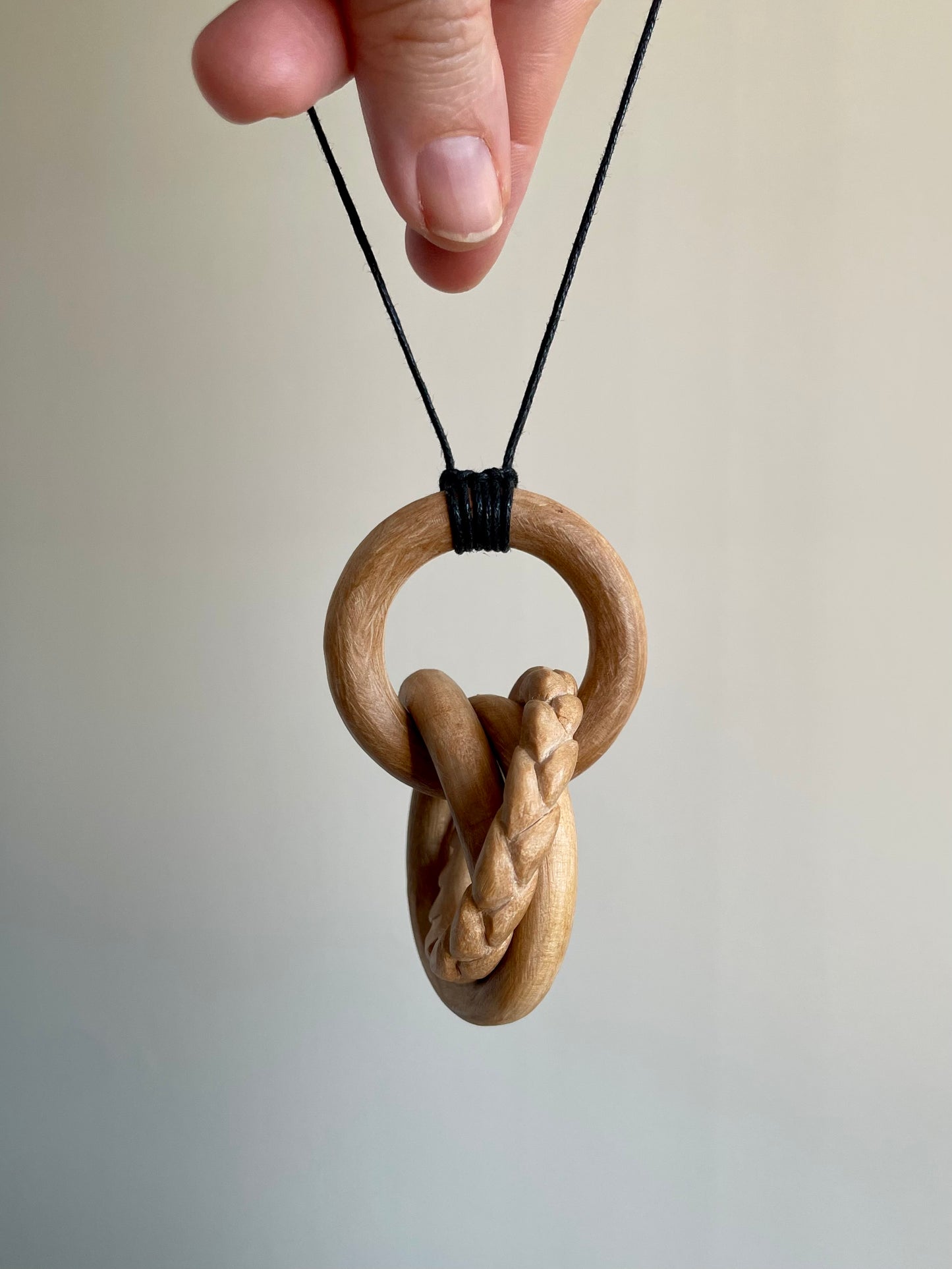 Large 4-Ring Knot with Braided Wheat Carving
