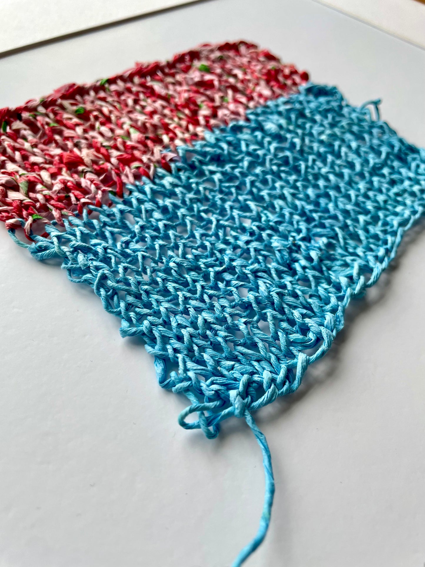 Study with knitted tissue paper in blue and apple print