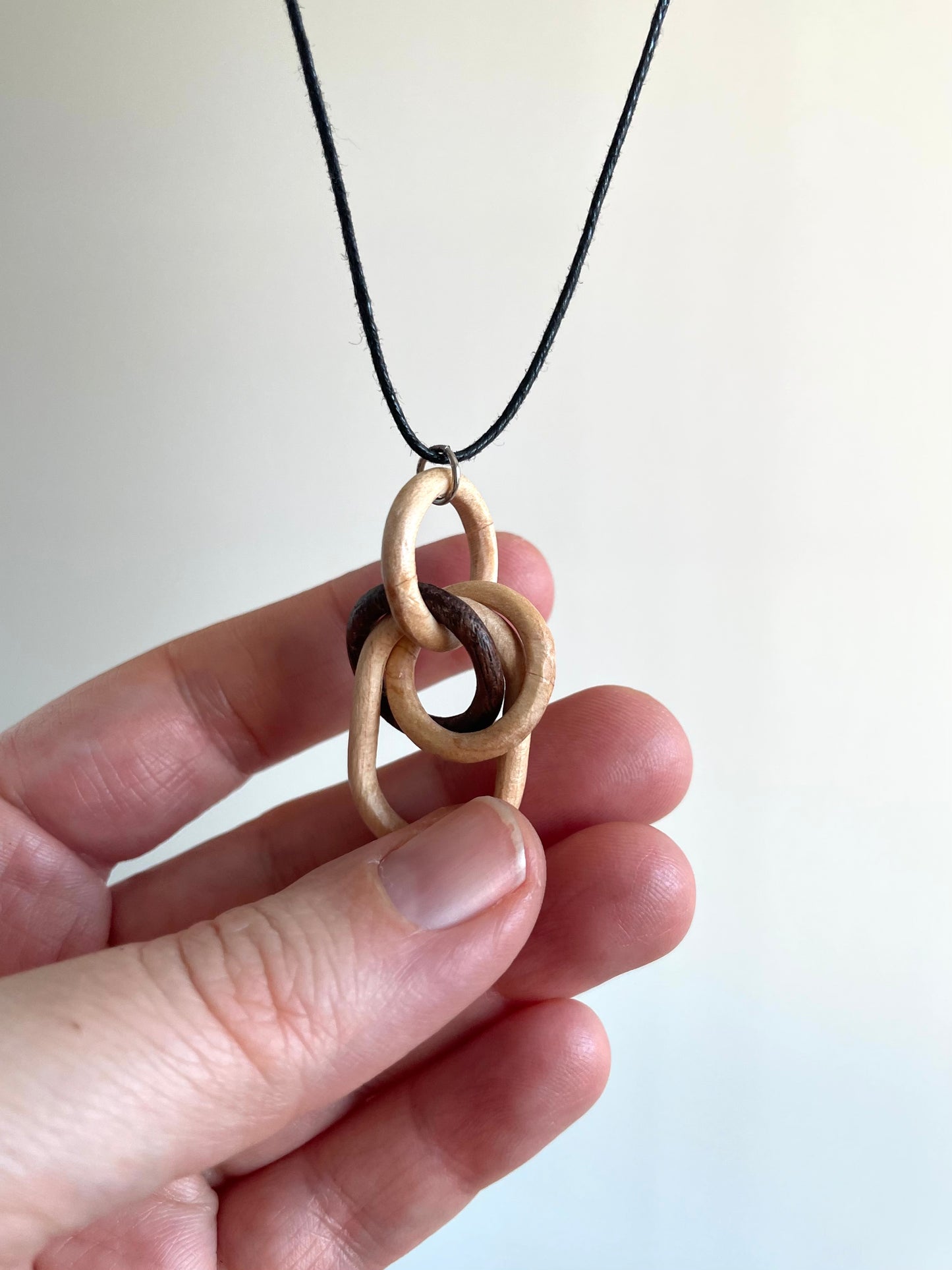 Walnut and Maple Knot with Oval Link