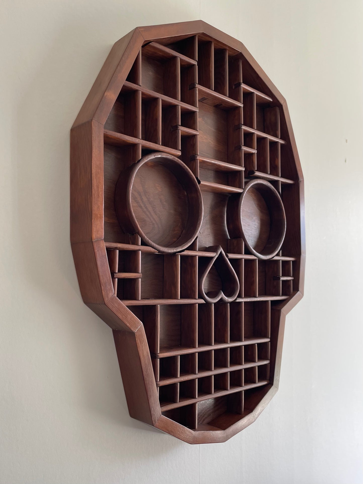 Skull-Shaped Curiosity Cabinet