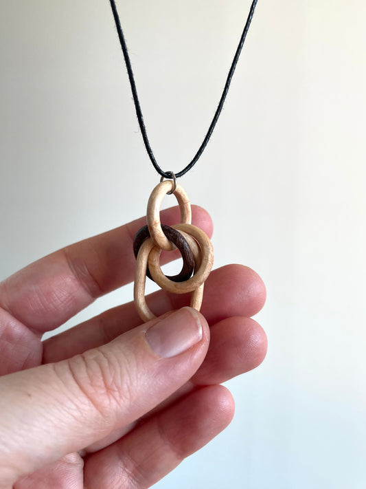Walnut and Maple Knot with Oval Link